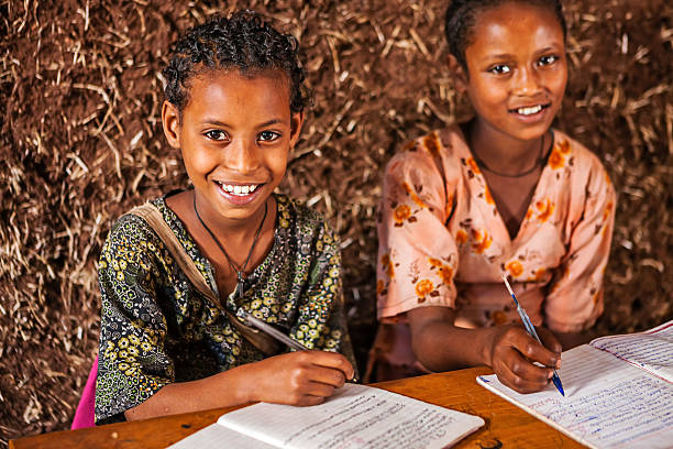 istock African little girls are learning Amharic language 468880668