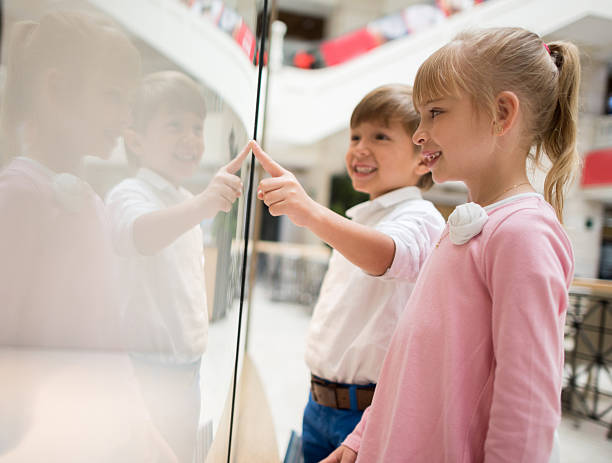 istock Kids window shopping at the mall 468880752