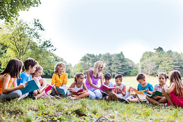 istock Large group of children having a class in nature. 468880842