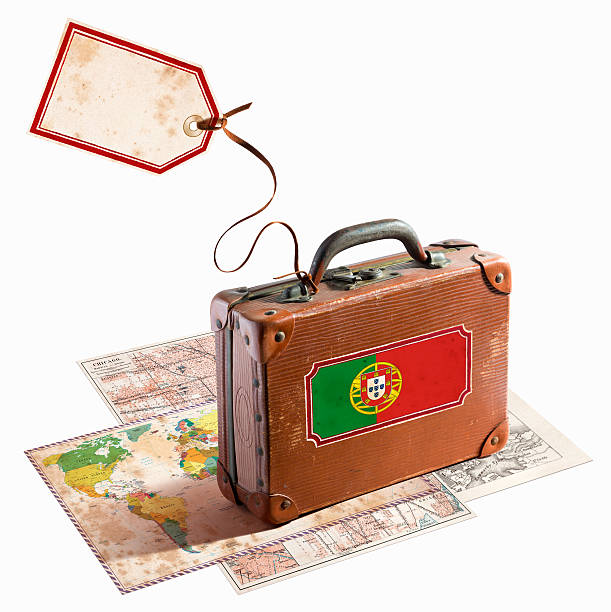 istock Antique leather suitcase on different maps Portugal flag 468881407