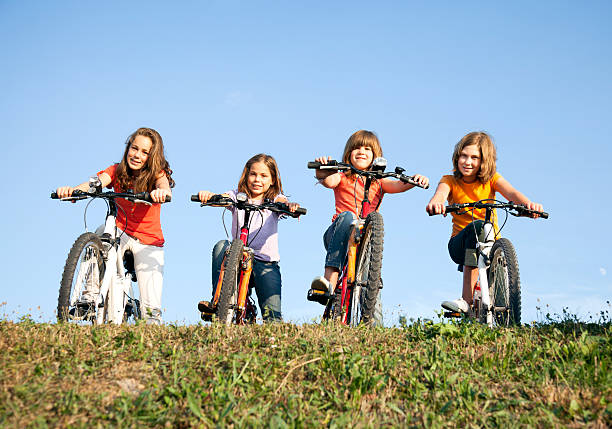 istock Four children riding bycycles 468885222