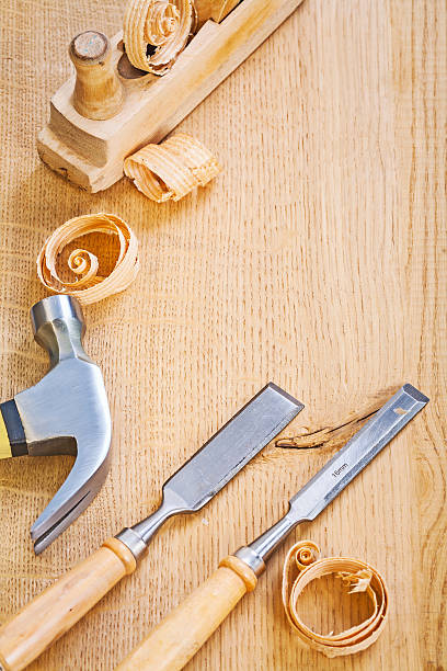 istock chisels claw hammer and woodworkes plane 468888194
