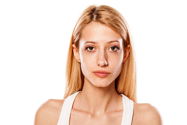 istock Beautiful serious blonde girl without make up 468892016