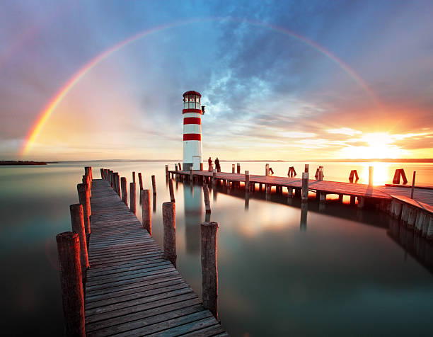 phare du lake neusiedl-autriche - beach sunrise waterbreak sea photos et images de collection