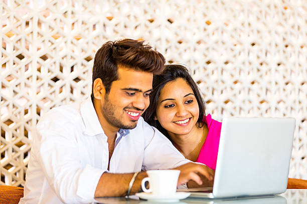 istock Indian couple sitting in cafe 468893404