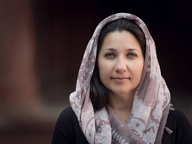 istock Woman portrait with head scarf 468893538