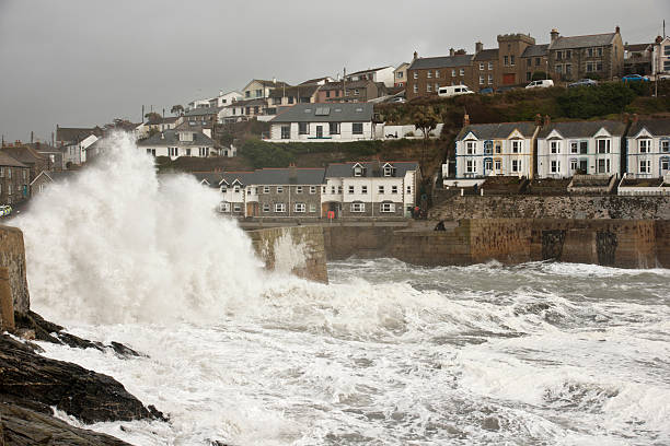 istock Waves battering the harbour at Porthleven Cornwall during a storm 468893915