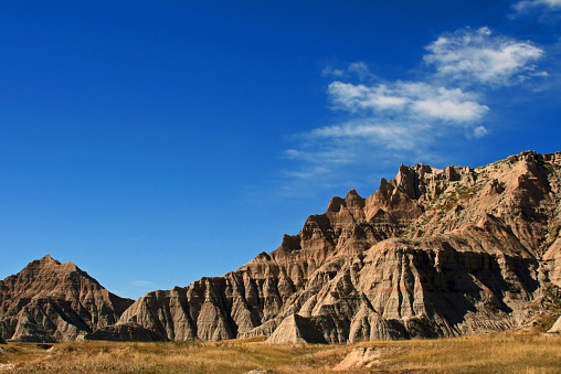 Badlands National Park with view of clouds that look like smoke signals