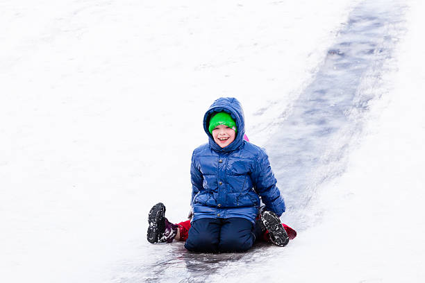 istock Children riding the hills in winter 468896618