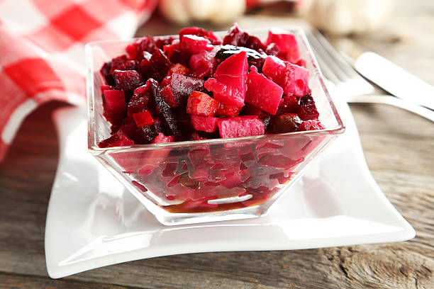 istock Beetroot salad in clear bowl on grey wooden background 468896704