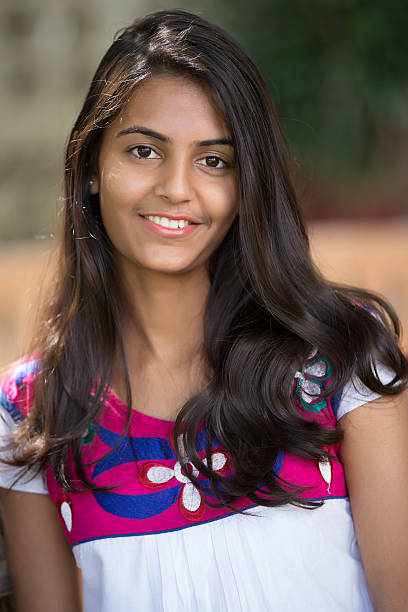 istock Happy indian young woman 468899018