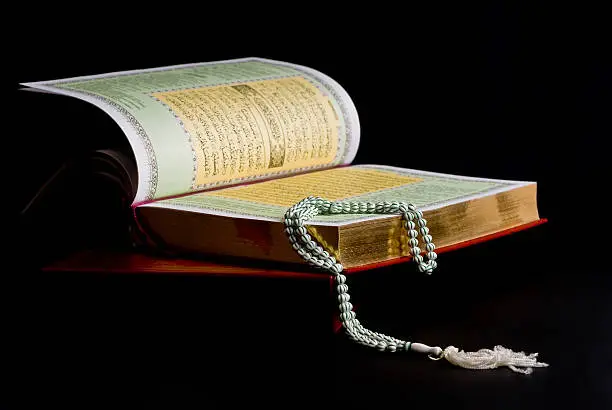 holy book quran black background