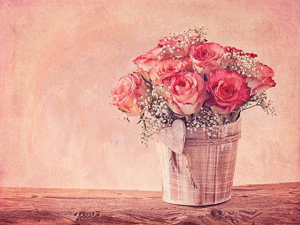 stockillustraties, clipart, cartoons en iconen met pink roses and old books - vase texture