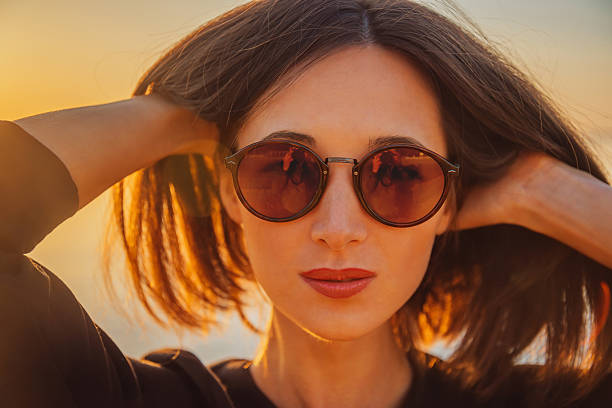 istock Attractive brunette woman in sunglasses 468903024