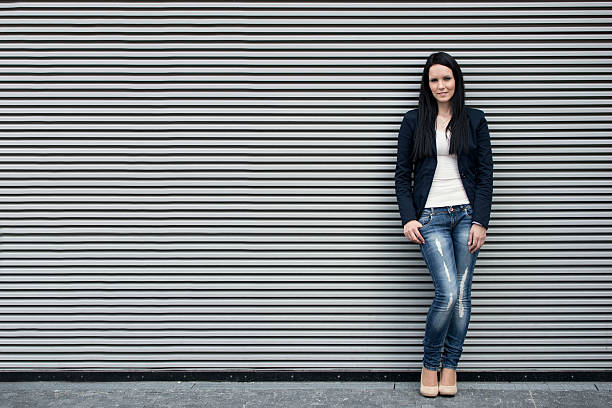 istock Woman portrait at striped wall 468905383