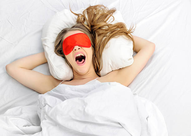 istock sleepy woman 468905929