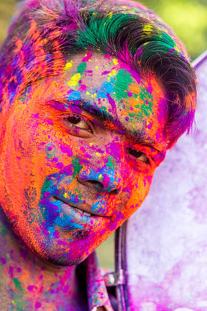 istock Young Adult celebrationg holi. 468906260