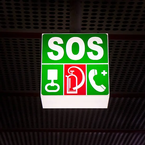 Sos placard on subway station - concept image