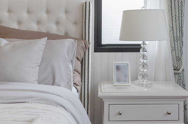 istock luxury bedroom with lamp on table 468910266