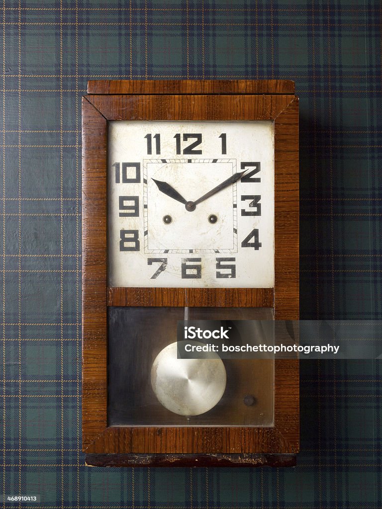 Vintage Wall Clock with Clipping Path Vintage clock on wall reads ten past ten. Clipping path included for easy change background. Pendulum Stock Photo