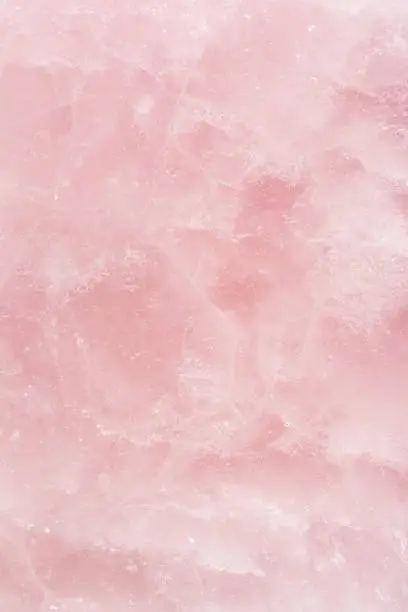 Pink  quartz close up. Rose quartz is often called the  Love Stone it opens  the heart chakra