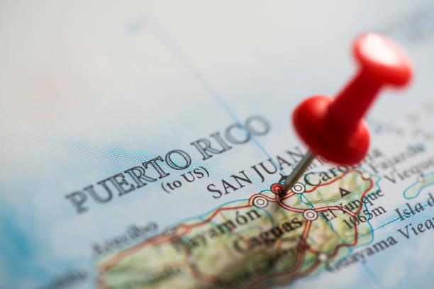 Puerto Rico Pinned on Map Close up shot of a map. San Juan pinned with a red pushpin. Municipio de San Juan Bautista is the capital and most populous municipality in the Commonwealth of Puerto Rico puerto rico photos stock pictures, royalty-free photos & images