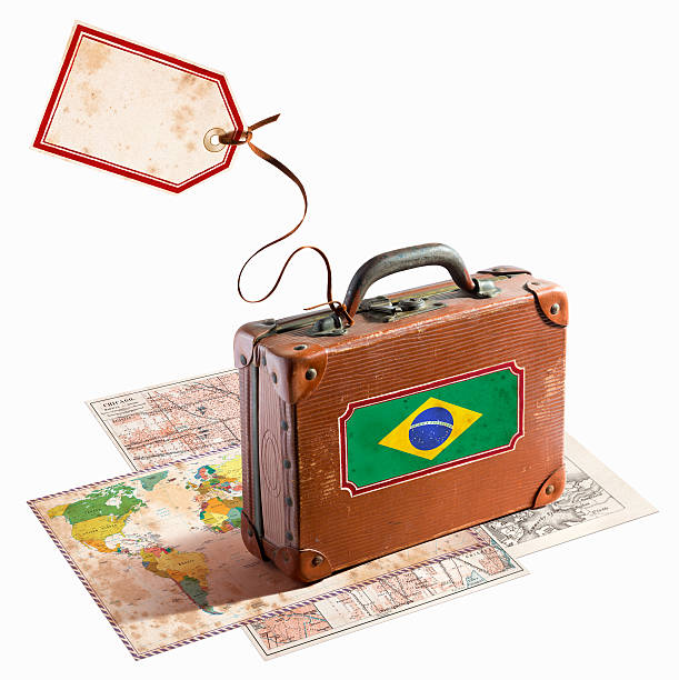 istock Antique leather suitcase on different maps Brazil Flag 468911407