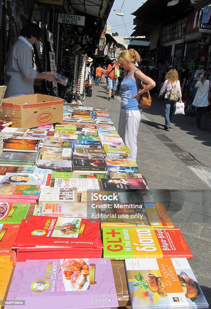 Greek book shop Athens, Greece - 25th May 2014: Unidentified people and various books at a book stand at Monastiraki street market in Athens, Greece Street Market Stock Photo