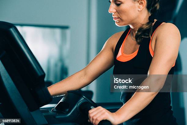 Woman Exercising On Treadmill Stock Photo - Download Image Now - 2015, Adult, Adults Only