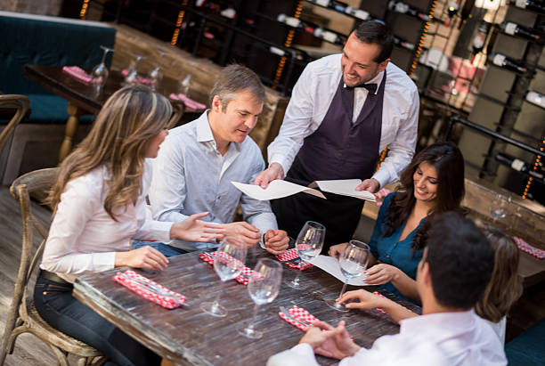 istock Group of friends having dinner at a restaurant 468917958