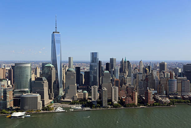 Manhattan skyline with One World Trade Center, New York New York, USA - October 06, 2014: Manhattan skyline with One World Trade Center, New York City, USA. großunternehmen stock pictures, royalty-free photos & images