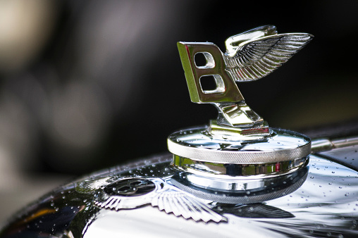 Vancouver, Сanada - May 18, 2013: Hood ornament detail from an antique Bentley automobile, seen at the annual All-British Field Meet classic and collector car event.
