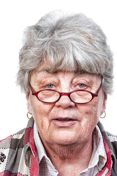 istock Smiling Grey Haired Woman Isolated on White with Glasses 468919094
