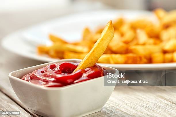 Ketchup With French Fries Stock Photo - Download Image Now - Ketchup, French Fries, Dipping