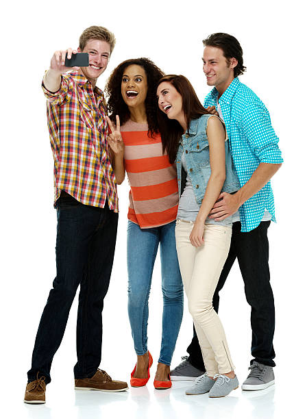 istock Smiling four friends taking a selfie 468922292