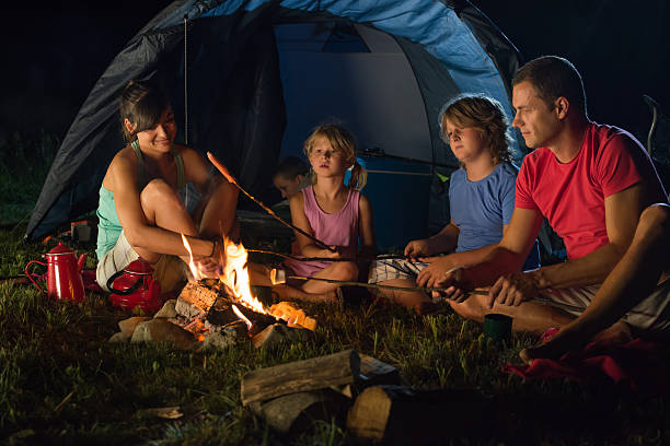 istock Happy Family Camping in Nature 468923189