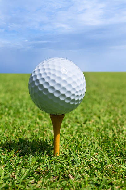 istock golf ball in green grass 468930719