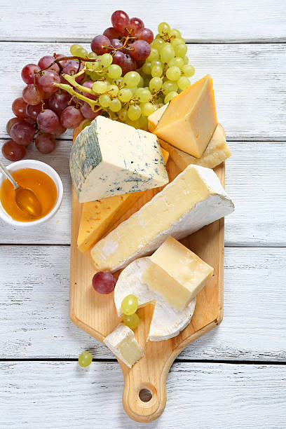 istock Cheeses with honey and grapes 468931308