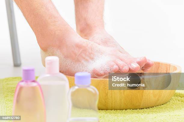 Male Feets In A Bowl Stock Photo - Download Image Now - 2015, Adult, Alternative Therapy