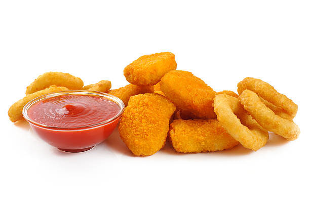 istock Nuggets, onion rings and ketchup. 468933490