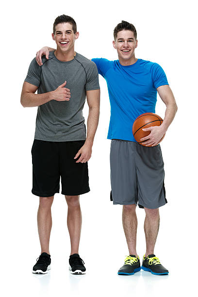 istock Two friends holding basketball 468935648