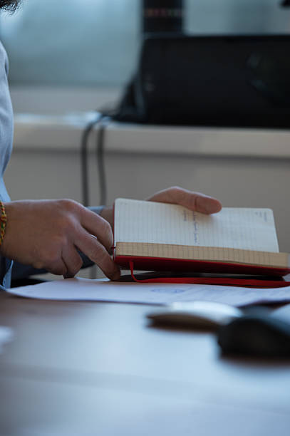 istock Handsome businessman planning his day in office. 468936304