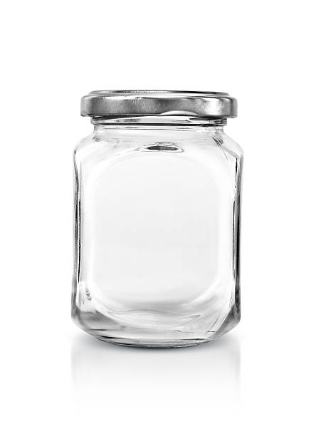 istock Clear glass bottle with silver cap isolated on white background 468936668