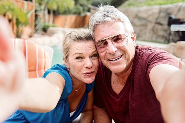 istock Mature couple in vacation, making selfie 468941356