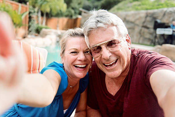 istock Mature couple in vacation, making selfie 468941382