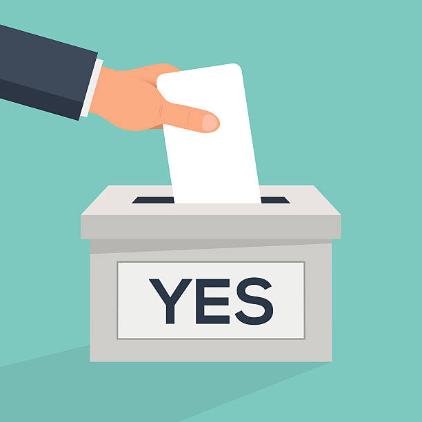 Cast your vote A vector illustration of a person posting a voting card into a ballot box. The caucasian hand comes in from the top left, the blank card is being placed into a grey ballot box. The box is casting a shadow towards the bottom left of the image. The background is light blue. On the front of the box is a white label with the word yes yes no icon stock illustrations