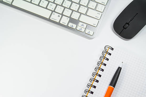 istock blank notebook with pen and keyboard in the office 468942166