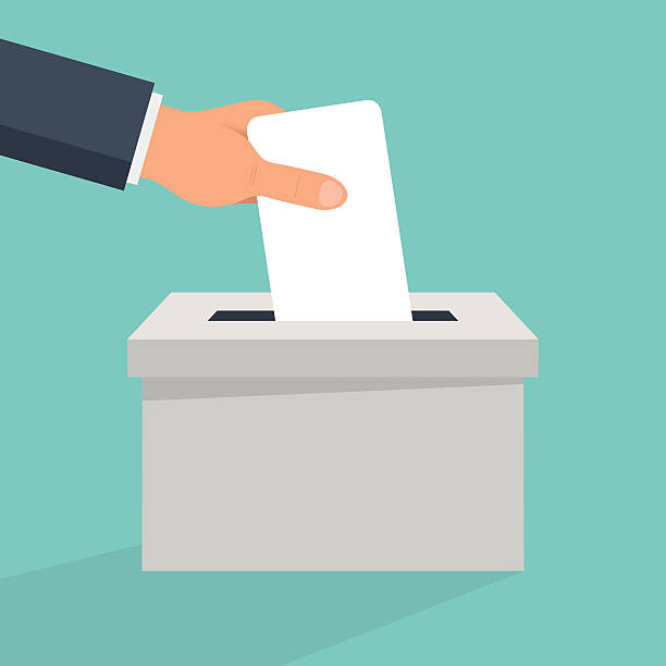 Cast your vote A vector illustration of a person posting a voting card into a ballot box. The caucasian hand comes in from the top left, the blank card is being placed into a grey ballot box. The box is casting a shadow towards the bottom left of the image. The background is light blue election illustrations stock illustrations