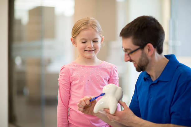 istock Little Girl at the Dentist 468943502