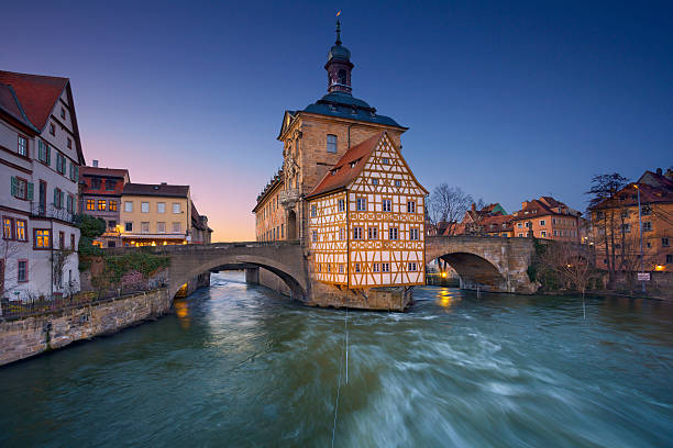 Bamberg. City of Bamberg during sunset. The Old Town Hall (1386) of Bamberg was built in the middle of Regnitz river. Two bridges connect it with the Old Town of Bamberg which is listed as a UNESCO World Heritage and famous for its medieval appearance. bamberg photos stock pictures, royalty-free photos & images